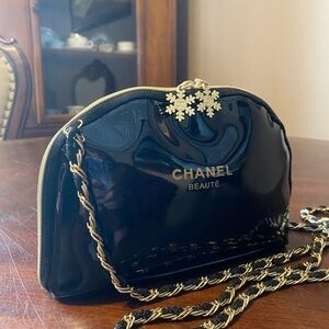 Chanel Beauté Glossy Black and Gold Cosmetic Bag
